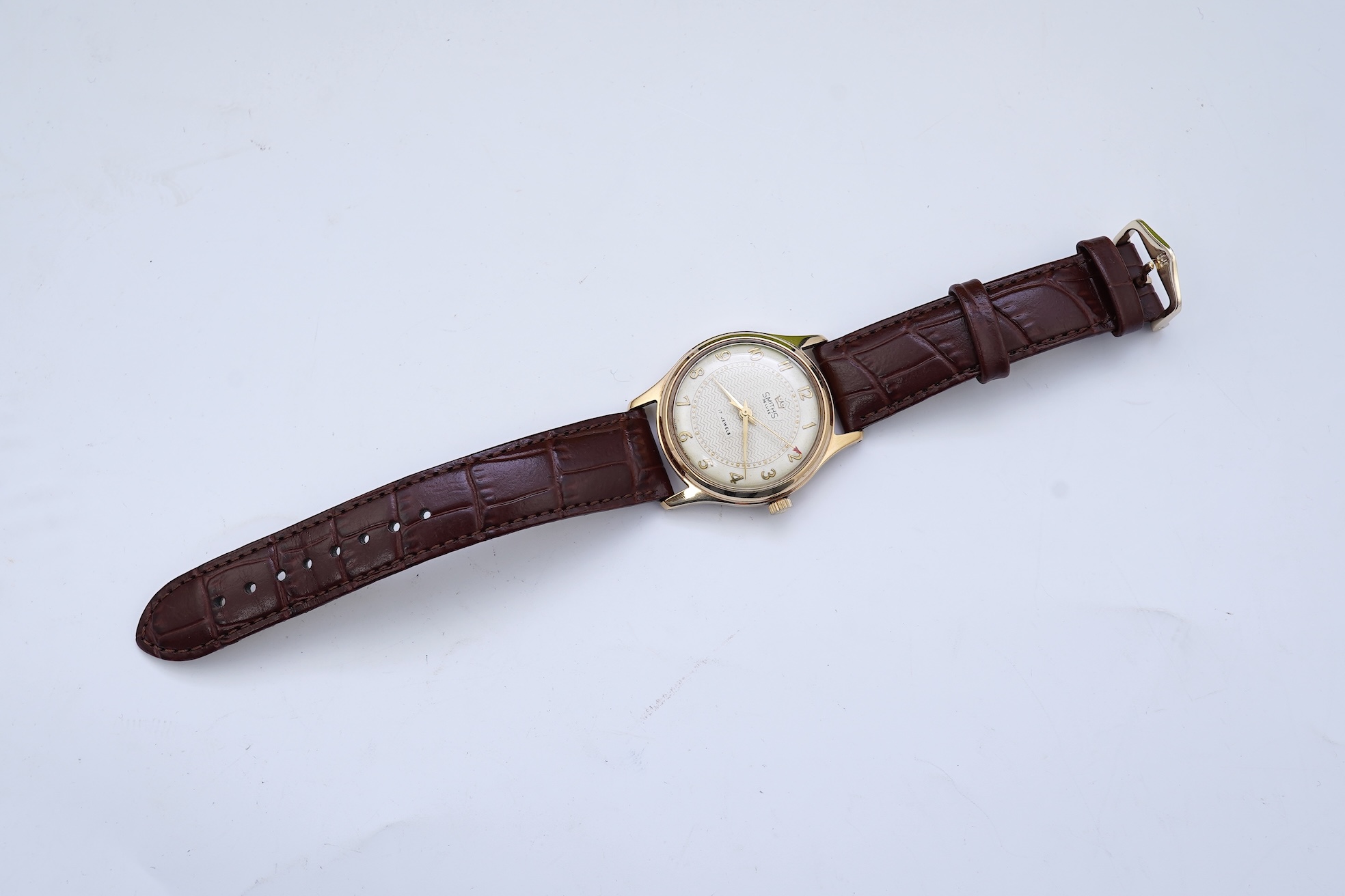 A gentleman's early 1960's 9ct gold Smiths De Luxe manual wind wrist watch